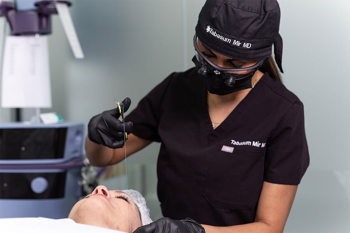 woman during neck threadlift in NYC